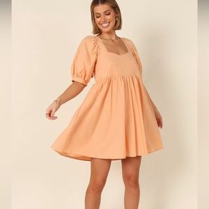 Orange petal and pup sundress. Size small. Never worn ! New with tags